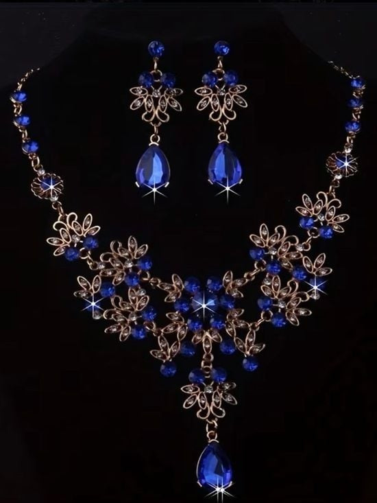 Gold Floral Filigree Necklace with Deep Blue Crystals